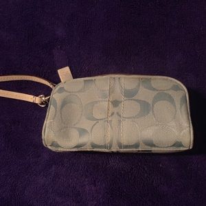Baby blue Coach cosmetic bag